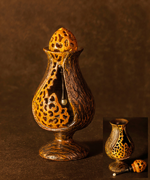 art of wood turning, wood turned craved vessel, turned wooden vessel, carved urn, carved wooden hollow form, carved vessel, wood turned vessel, pierced vessel, pierced hollow form, turned lidded vessel, wood lidded vessel, lidded urn, lidded hollow form, perfume vessel, wood turned lidded box, lidded box, wood turned box