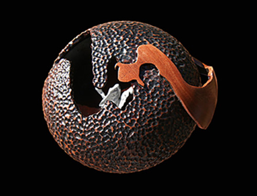 art of wood turning, wood turned craved vessel, turned wooden vessel, carved wooden hollow form, carved vessel, wood turned vessel, pierced vessel, wood turned art